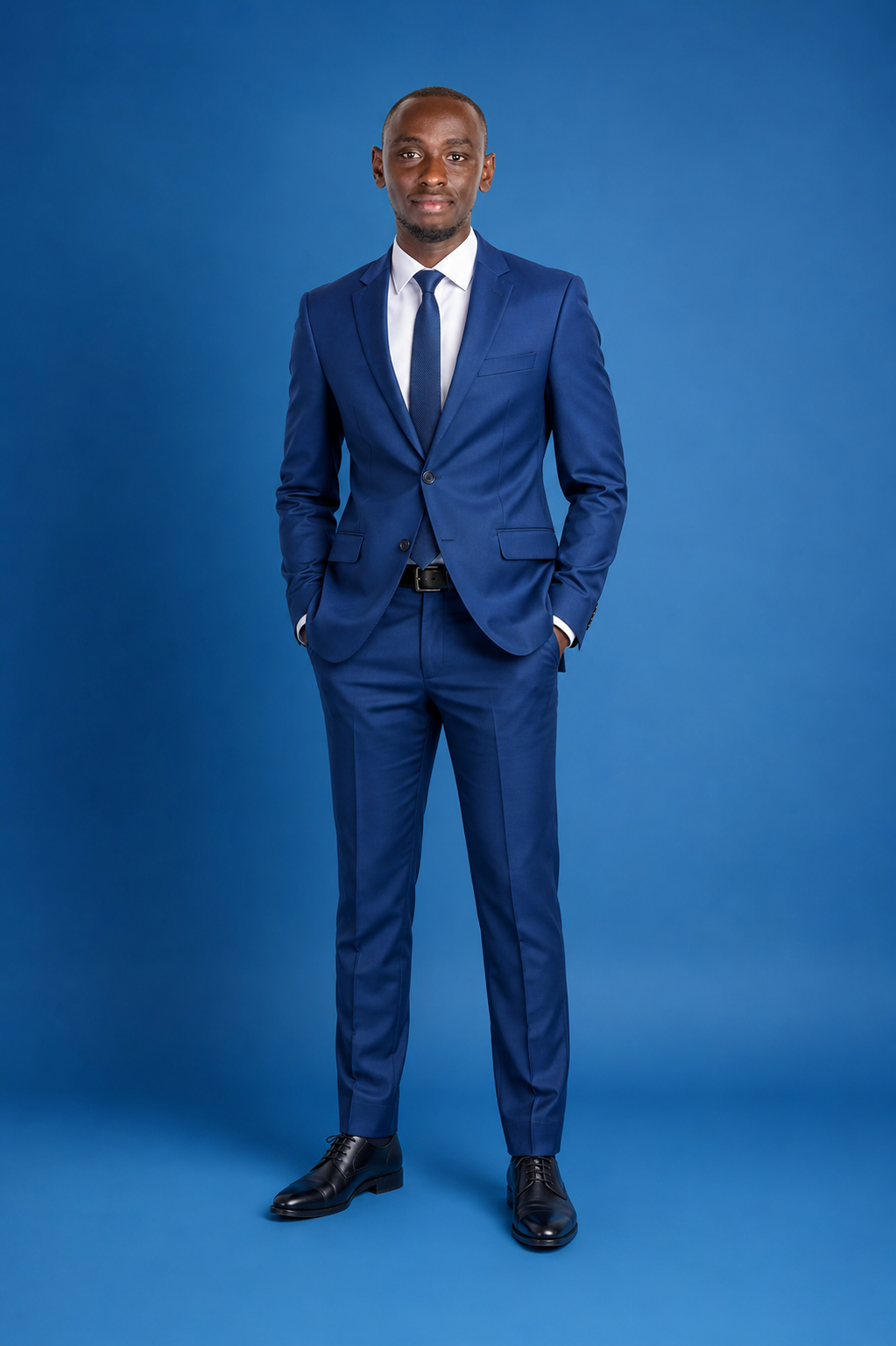 Portrait of Robin Kihiko in a tailored navy suit